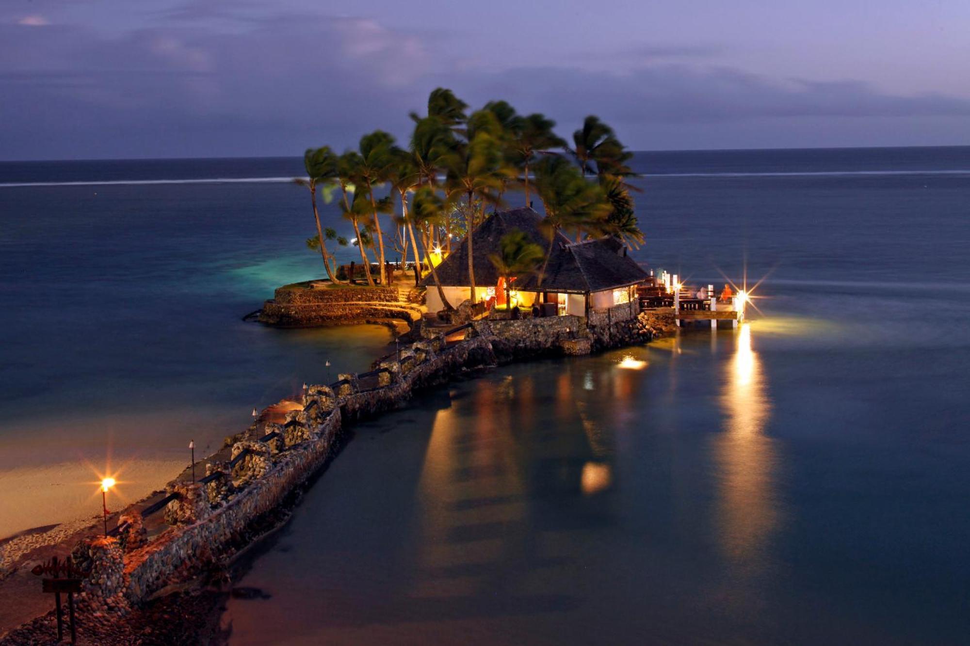 The Warwick Fiji Hotel Korolevu  Exterior photo The Rock at night